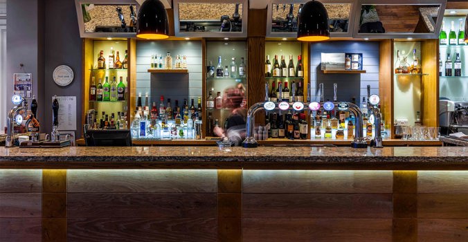 White Lion, Aldeburgh, Bar and person