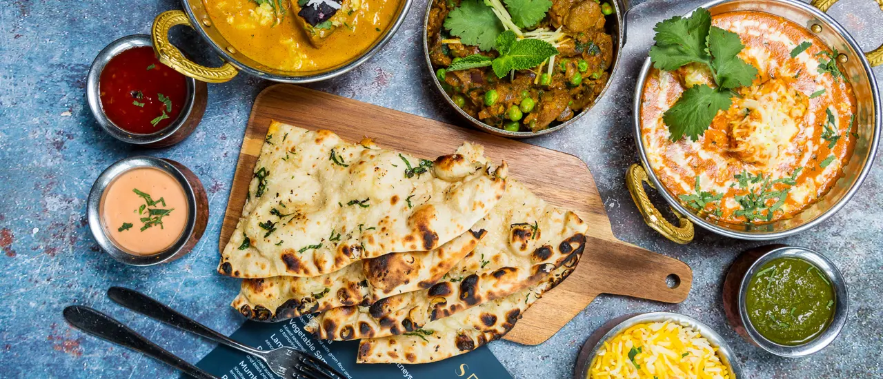 2024 menu with naan bread and dips