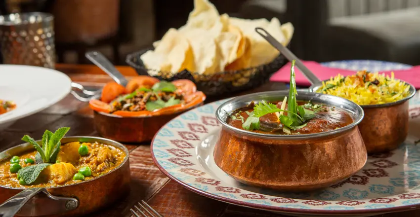 Sea Spice Aldeburgh curry dishes on table